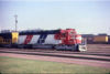 Santa Fe SD-45-2 #5704 rolls through San Bernardino, California in 1976.