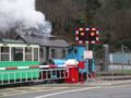 Steam train passing controlled crossing.jpg